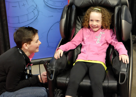 Madeline Enjoying THe Vibrating Chair